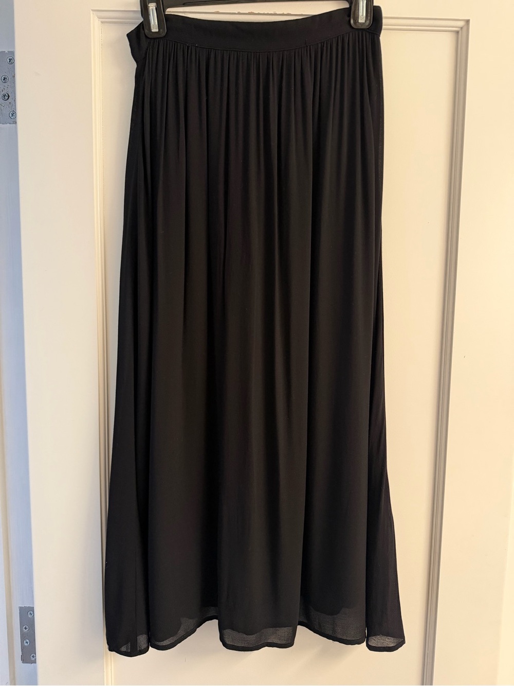 Reformation Black Midi Skirt with Flowing Silhouette